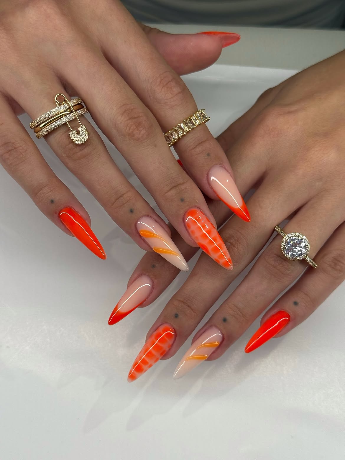 Neon Orange French Tip Stiletto Nails
