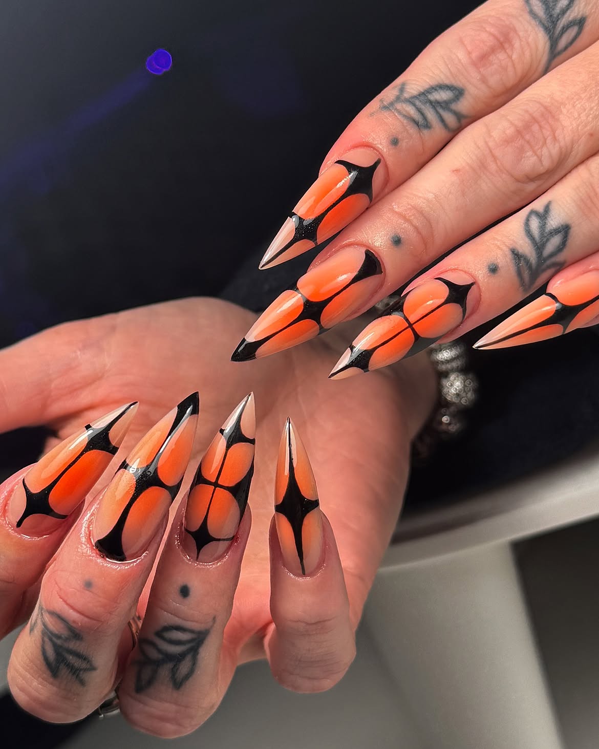 Orange And Black Geometric Stiletto Nails