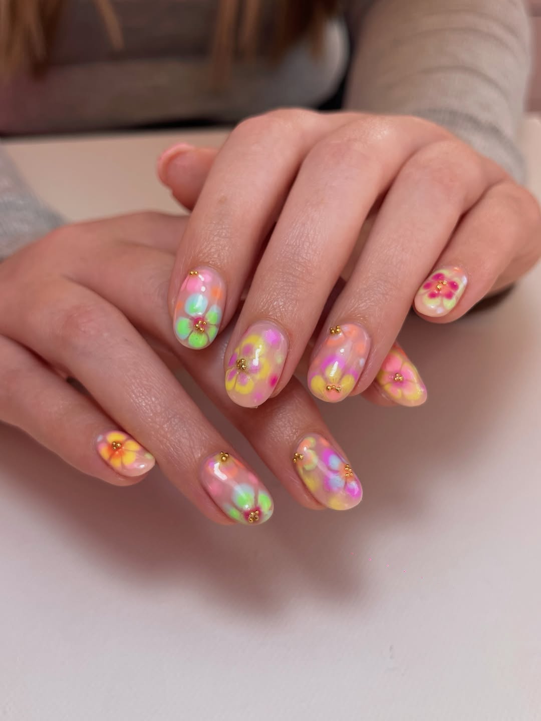 Pastel Floral Aura Gel Nails with Gold Accents