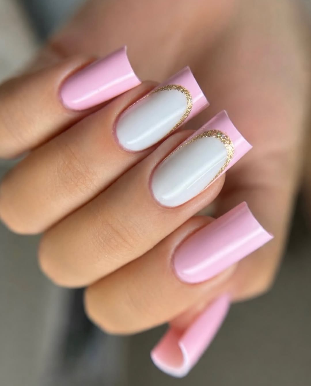 Pink French Tips with Gold Glitter Accent