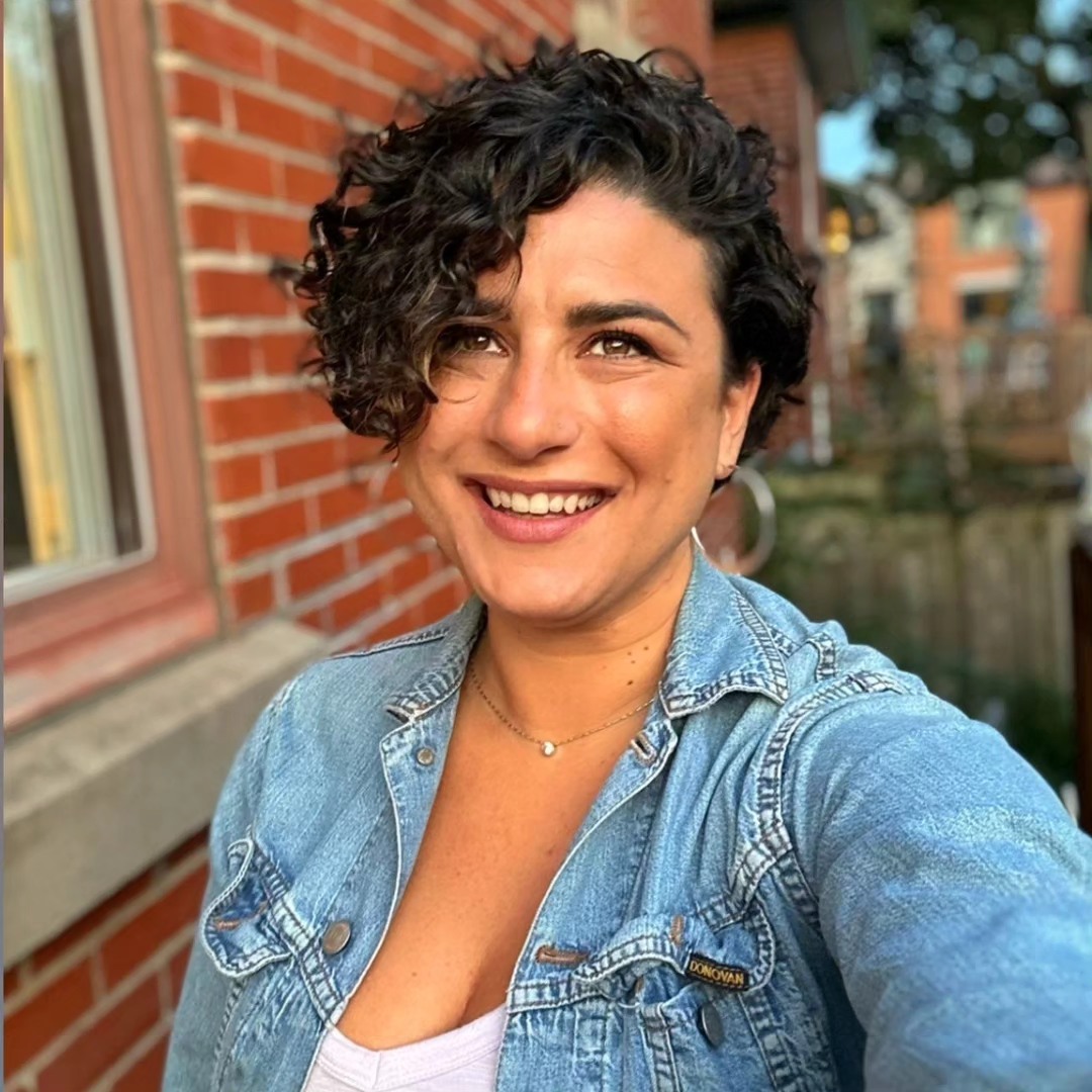 Playful Curly Pixie With Side-Swept Bangs