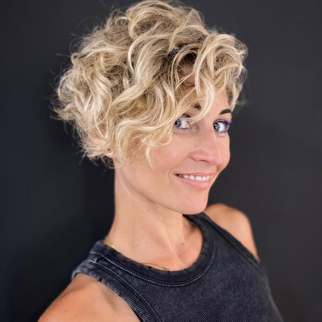 Playful Curly Pixie With Textured Bangs