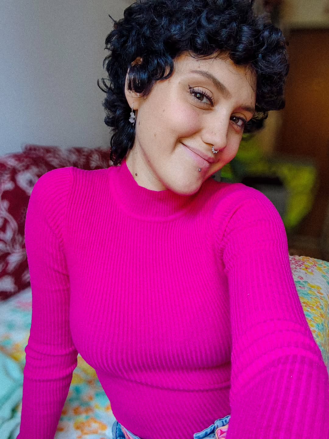 Playful Curly Pixie With Undercut Sides