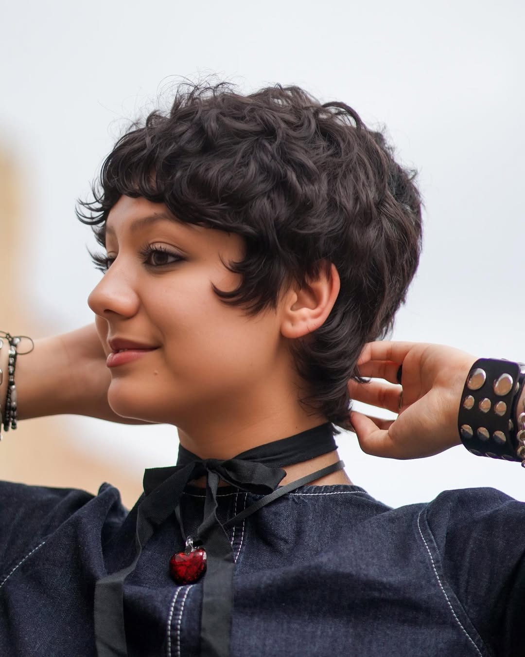 Playful Pixie Cut With Defined Dark Curls