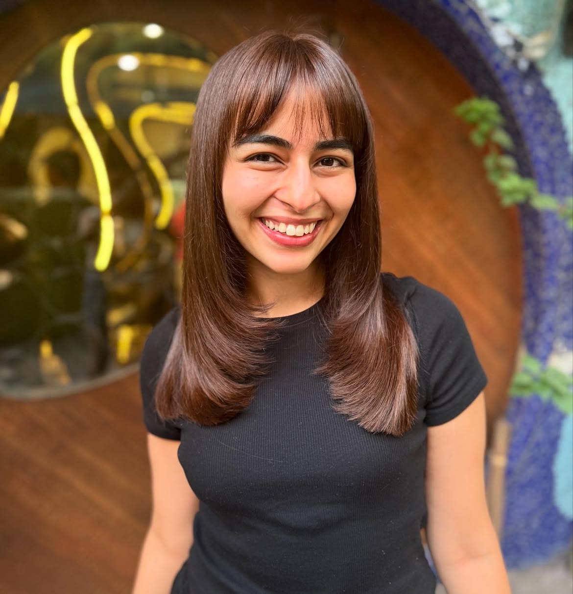 Sculpted Layers With Face-Framing Bangs