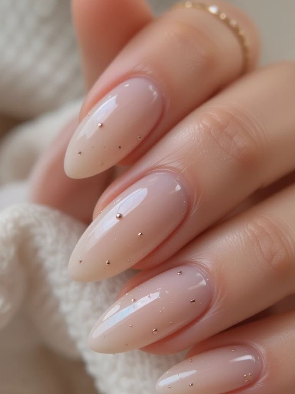 Sheer Milky Almond Nails with Rose Gold Dots
