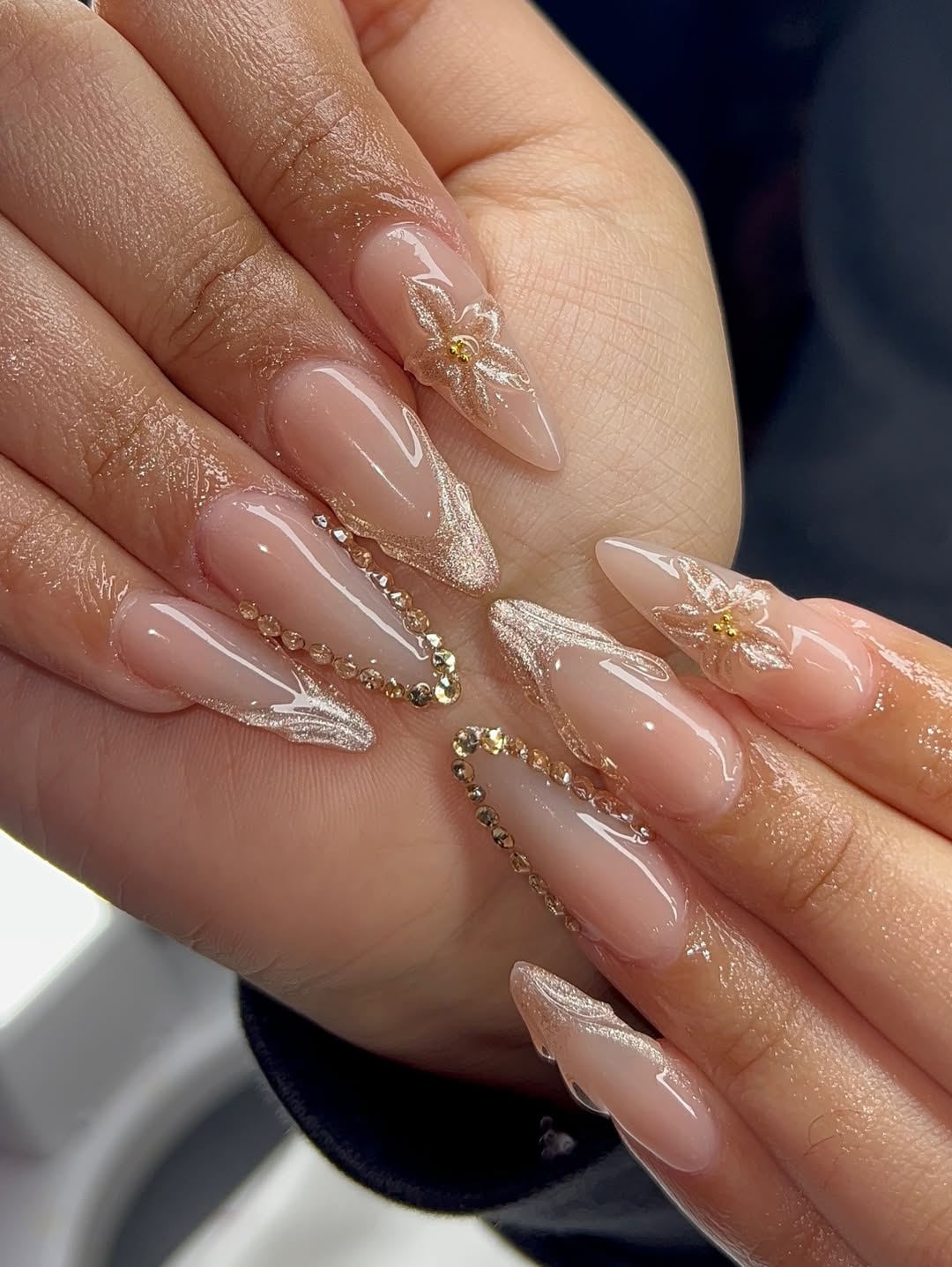 Sheer Nude Stiletto Nails with Gold Accents