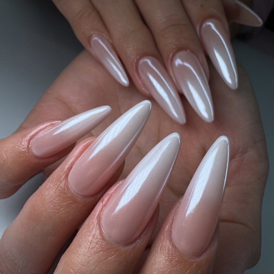 Shimmering Milky White Chrome Stiletto Nails