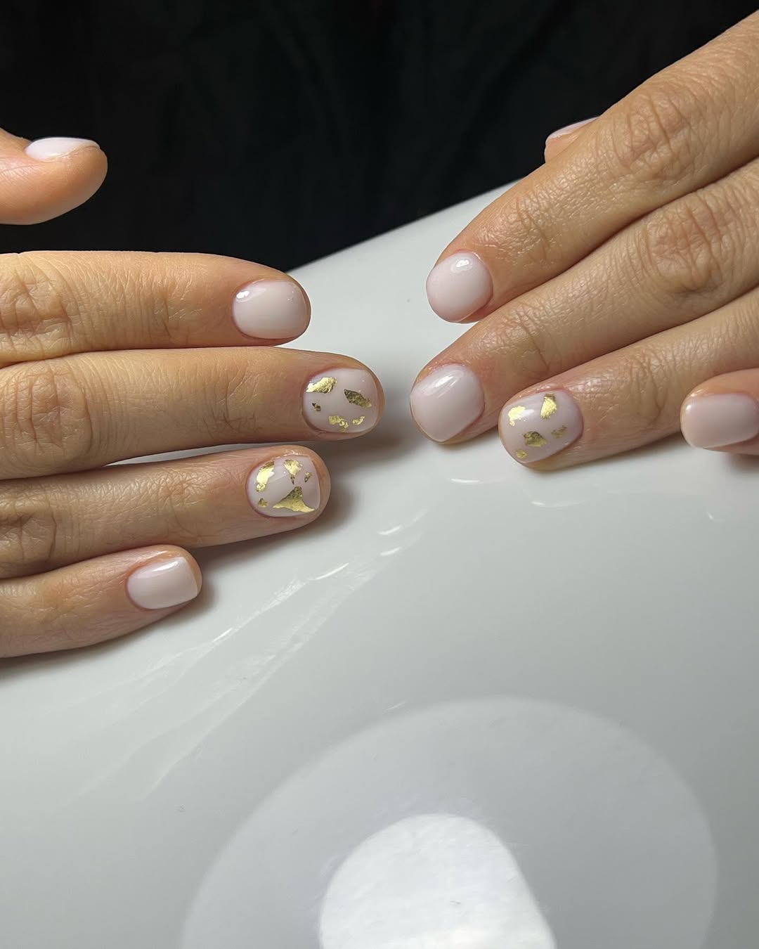 Short Milky Nude Nails with Gold Leaf Accents