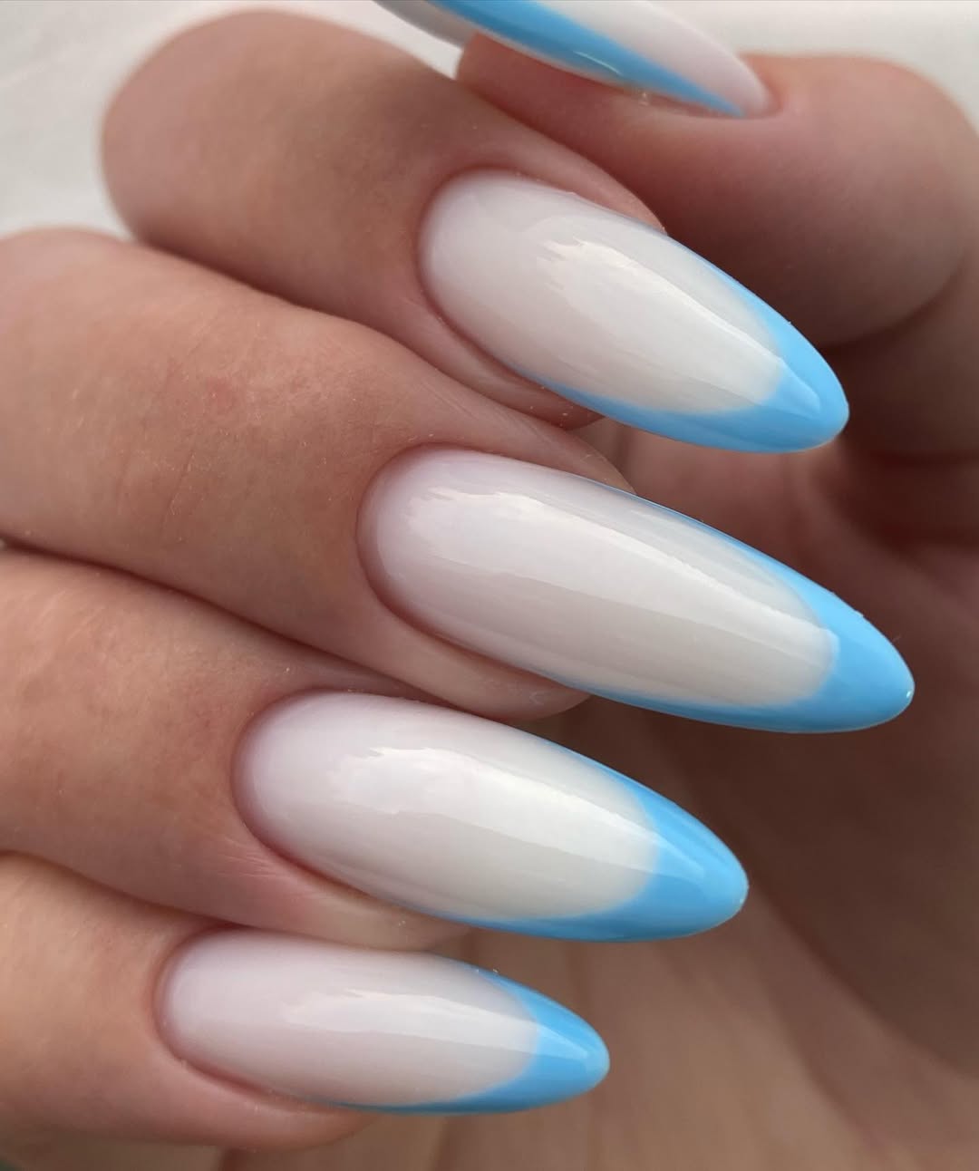 Sky Blue Classic French Tip Almond Nails