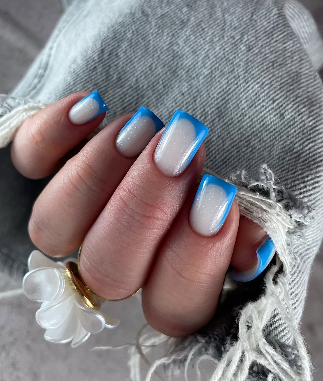 Sky Blue Glossy French Tip Nails