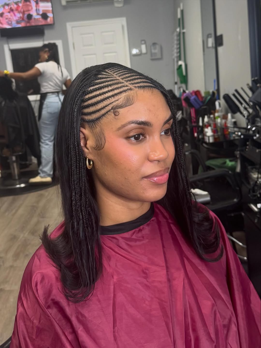Sleek Cornrows With Flowing Braided Extensions