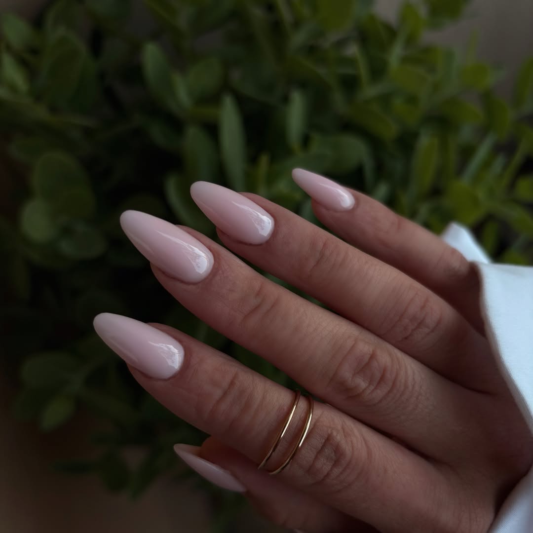 Soft Milky Pink Almond Nails With Glossy Finish