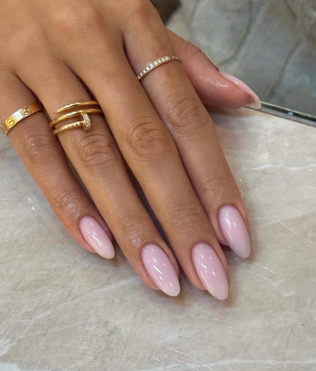 Soft Pearly Pink Almond Shaped Glossy Nails