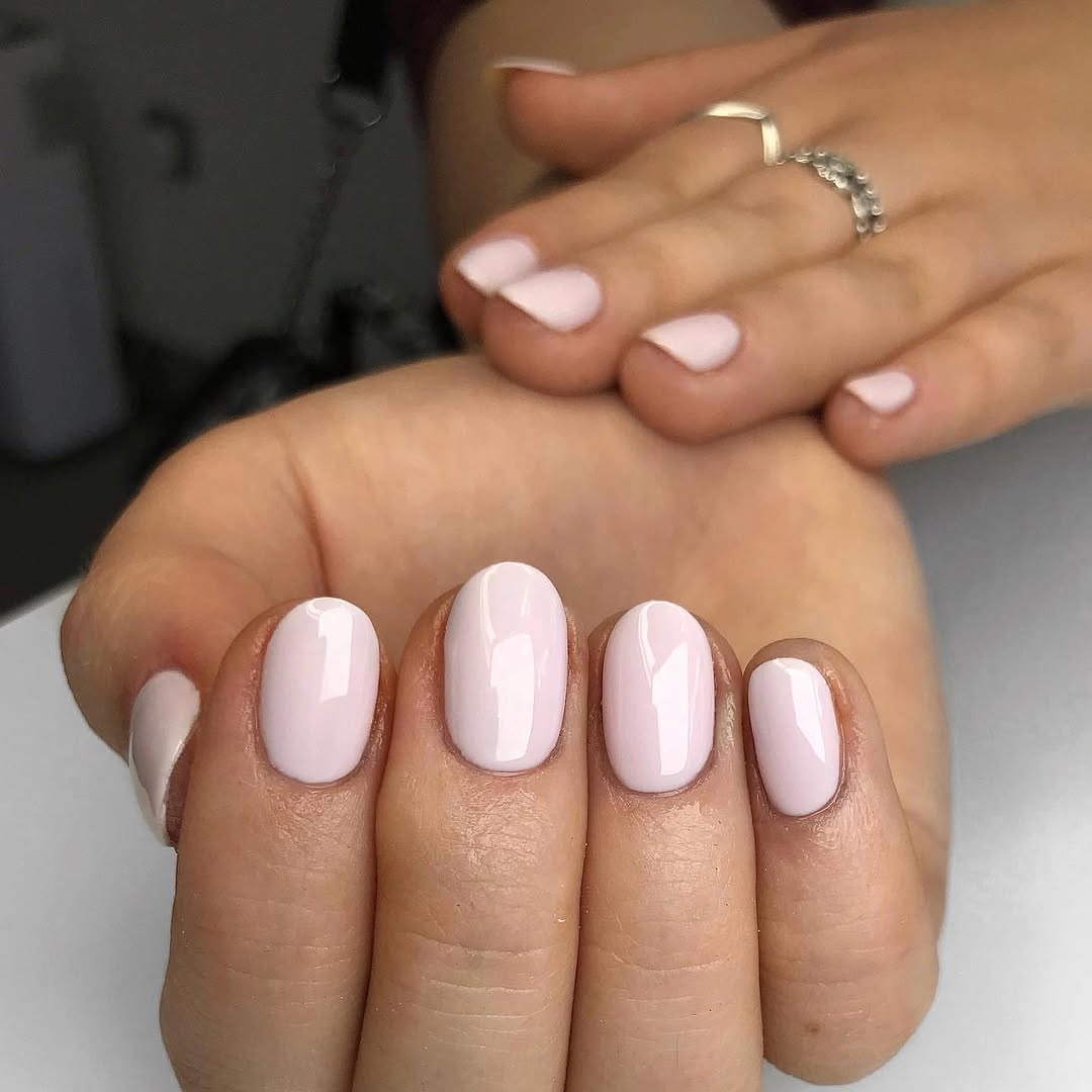 Soft Pink Glossy Short Oval Nails