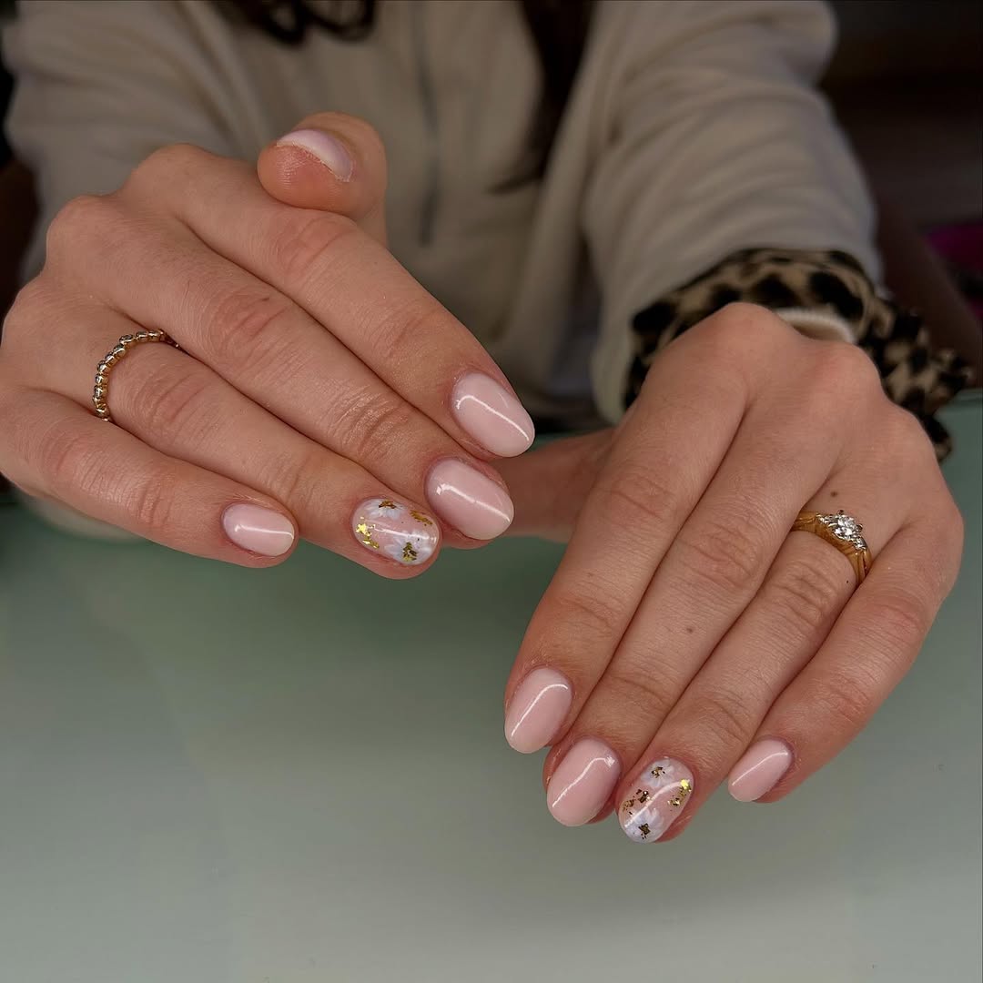 Soft Pink Marble Nails with Gold Foil Accents