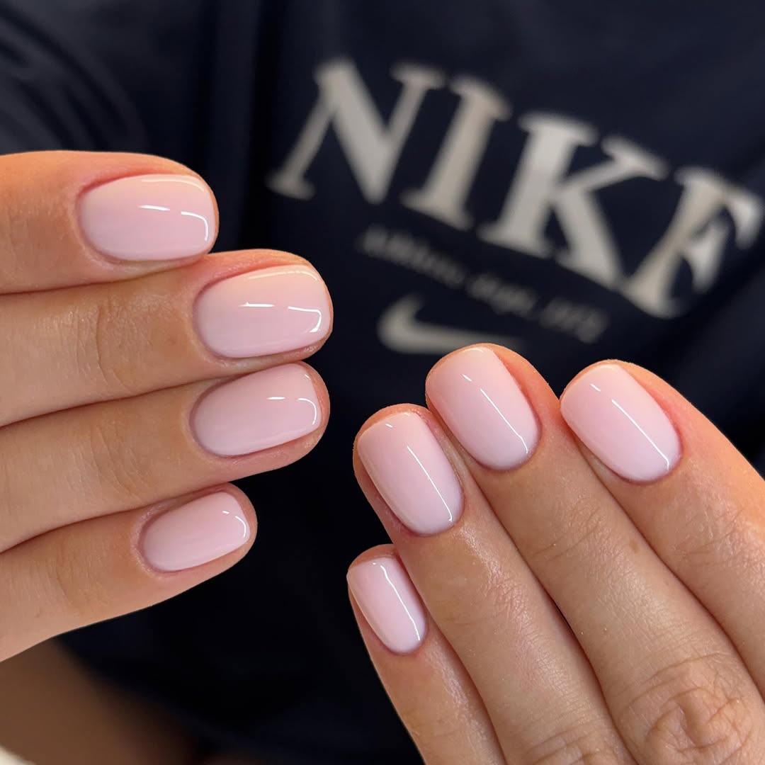 Soft Pink Milky Oval Nails With Glossy Finish