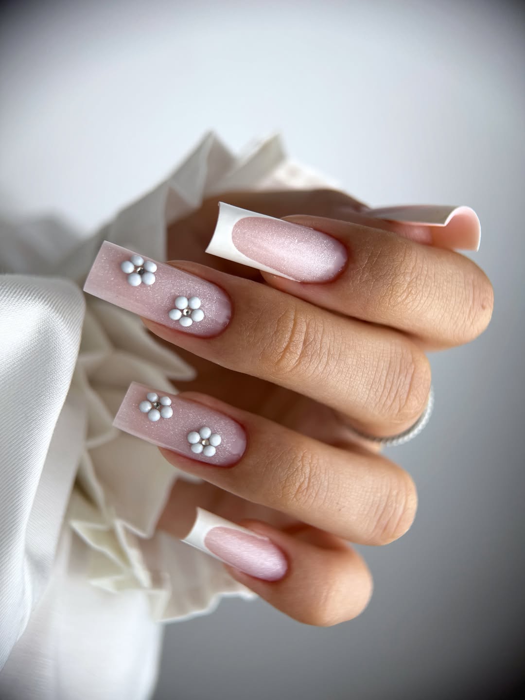 Sparkly Pink French Tips with Pearl Flower Accents