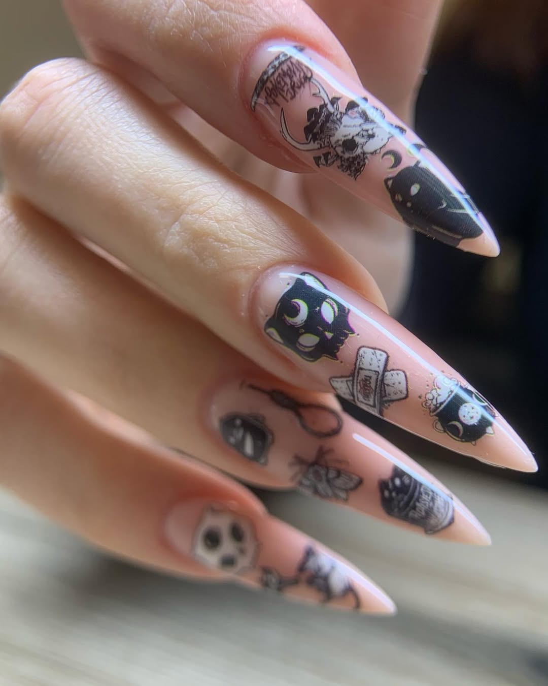 Spooky Black Cat Stiletto Nails with Goth Motifs