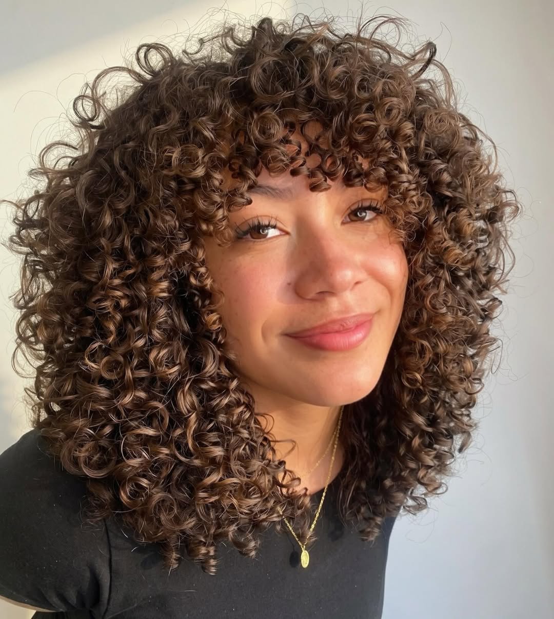 Tousled Curly Lob With Caramel Highlights