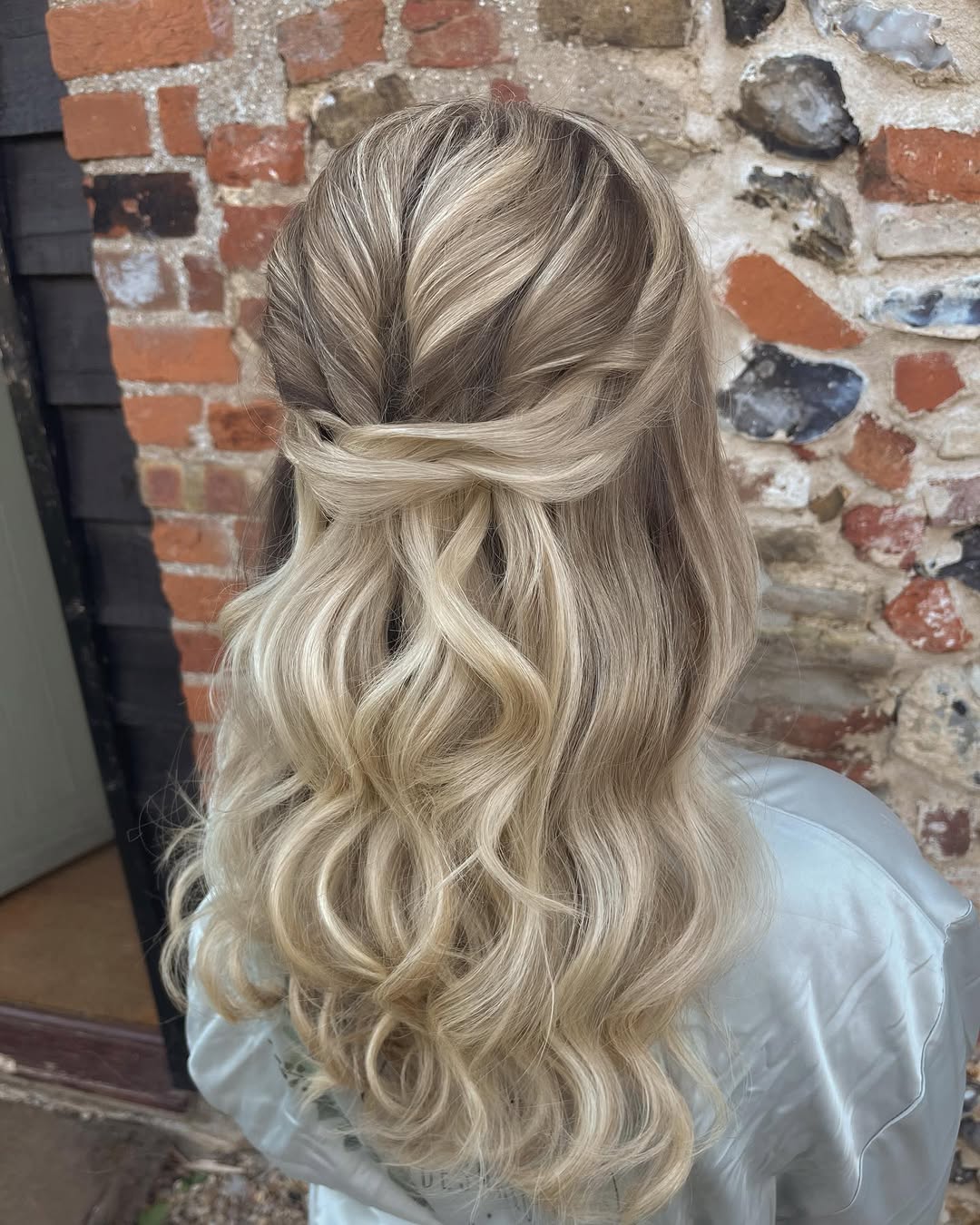 Twisted Half-Up Wedding Style With Warm Blonde Balayage