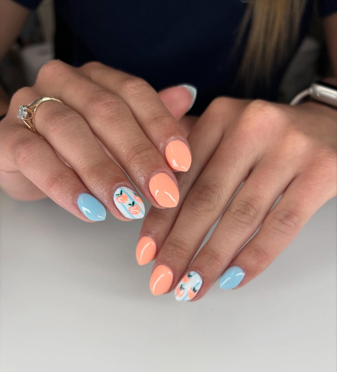 Vibrant Peachy Blue Oval Nails with Peach Art