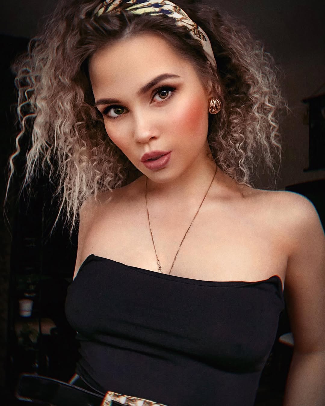 Voluminous Curly Hair With Chic Bandana Style