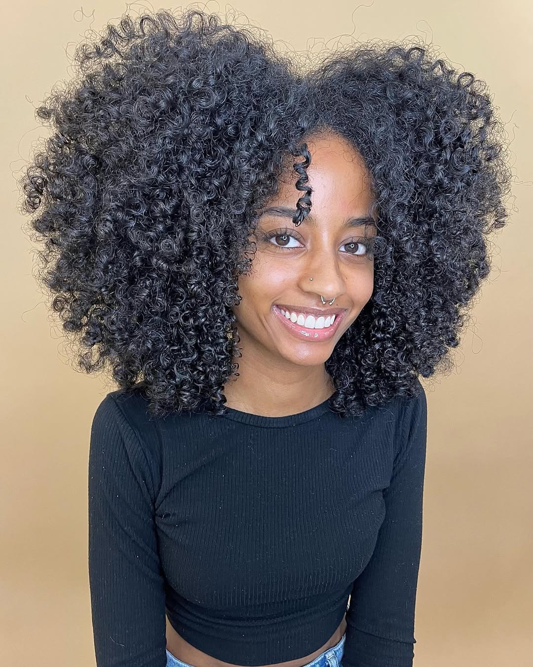 Voluminous Dark Curly Lob With Defined Spiral Curls