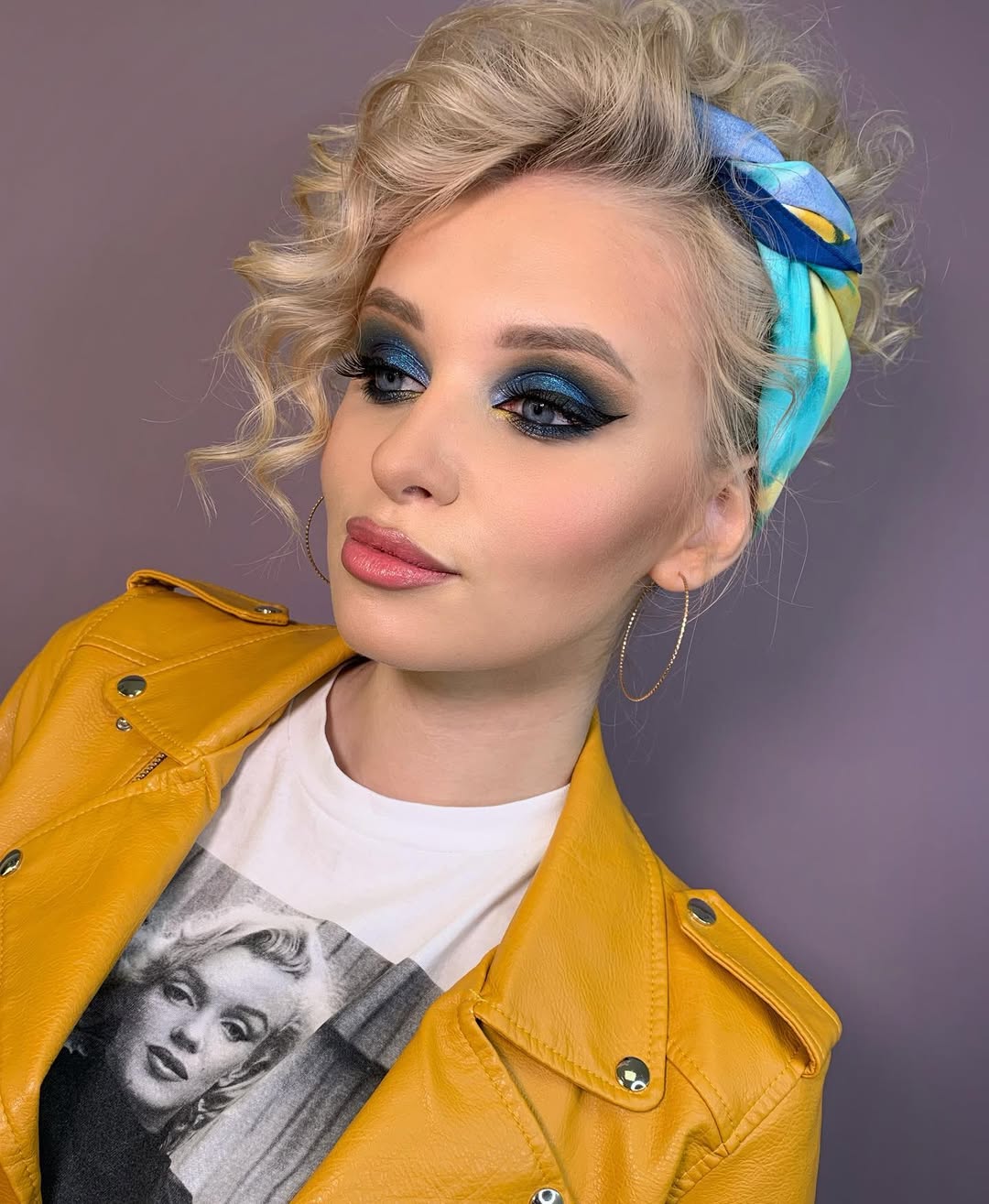 Voluminous Retro Updo With Colorful Silk Scarf