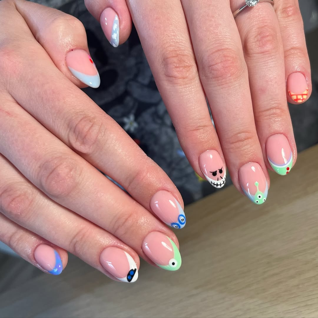 Whimsical Disney Character French Tip Short Oval Nails