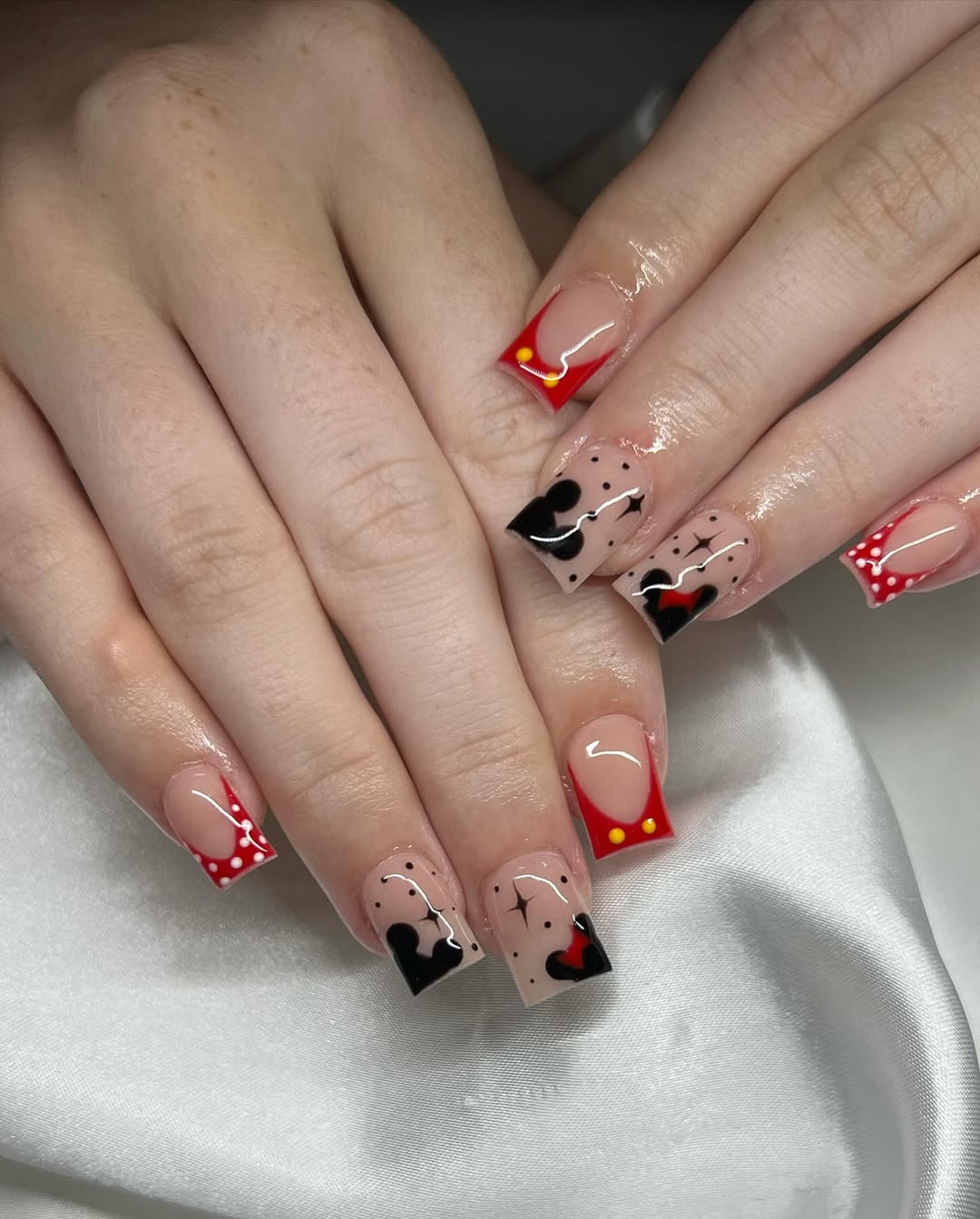 Whimsical Disney Inspired French Tips with Mickey and Minnie