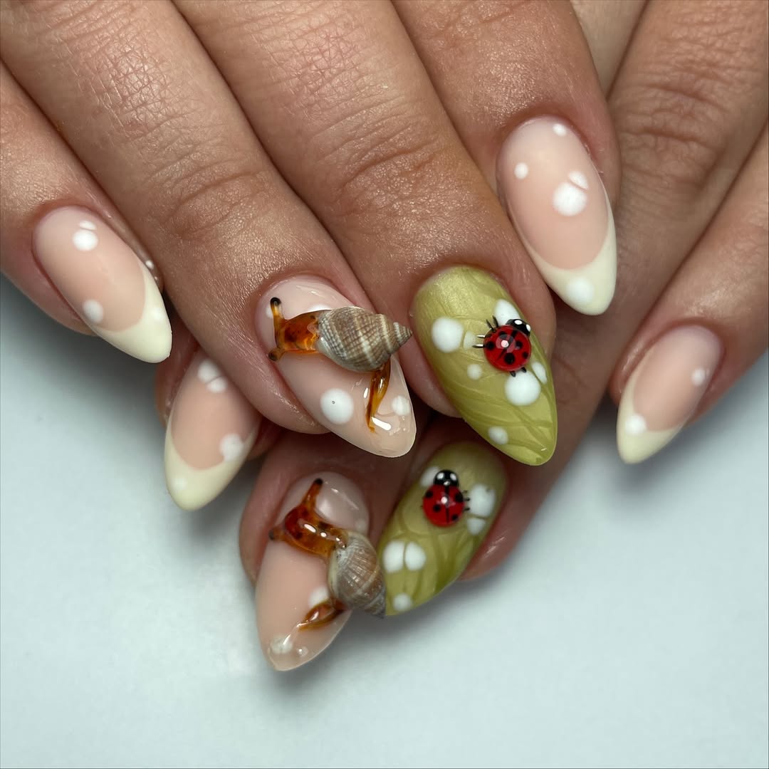 Whimsical Ladybug and Snail Shell Accented Almond French Nails