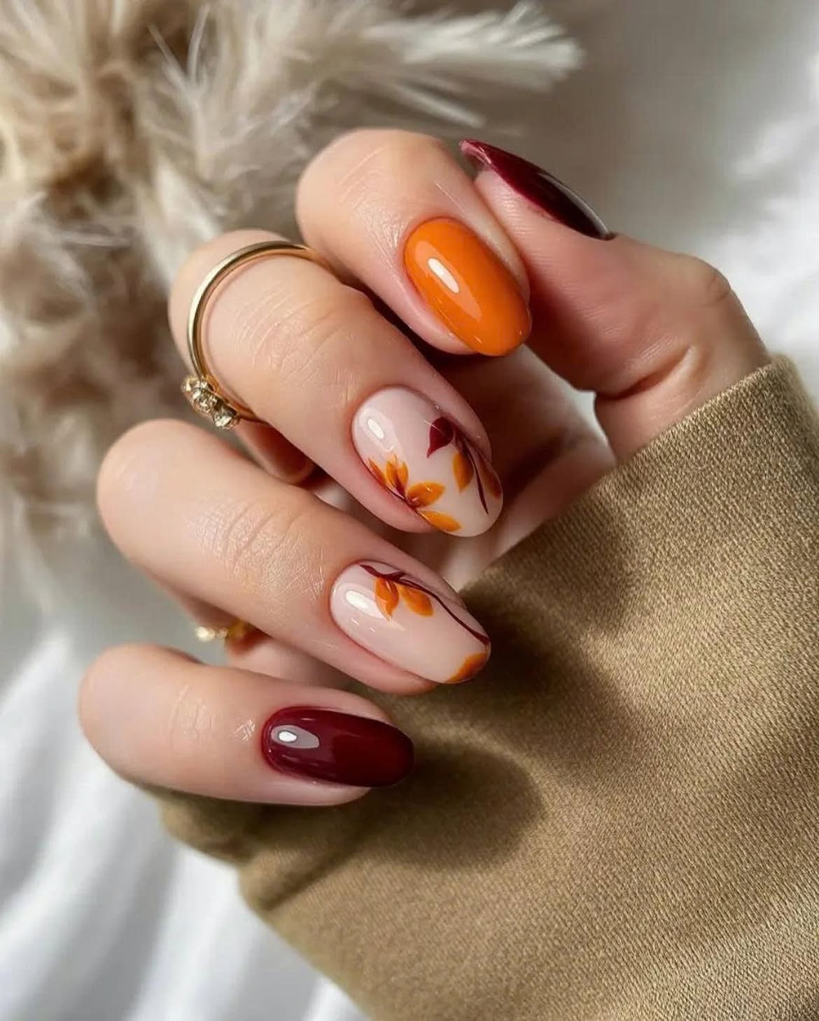 Autumn Leaf Oval Nails with Burgundy & Orange Accents