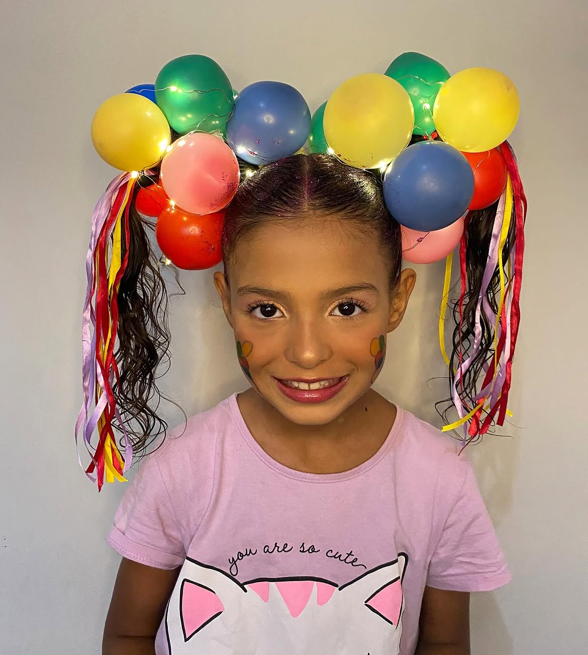 Balloon Ponytails with Ribbons and Lights