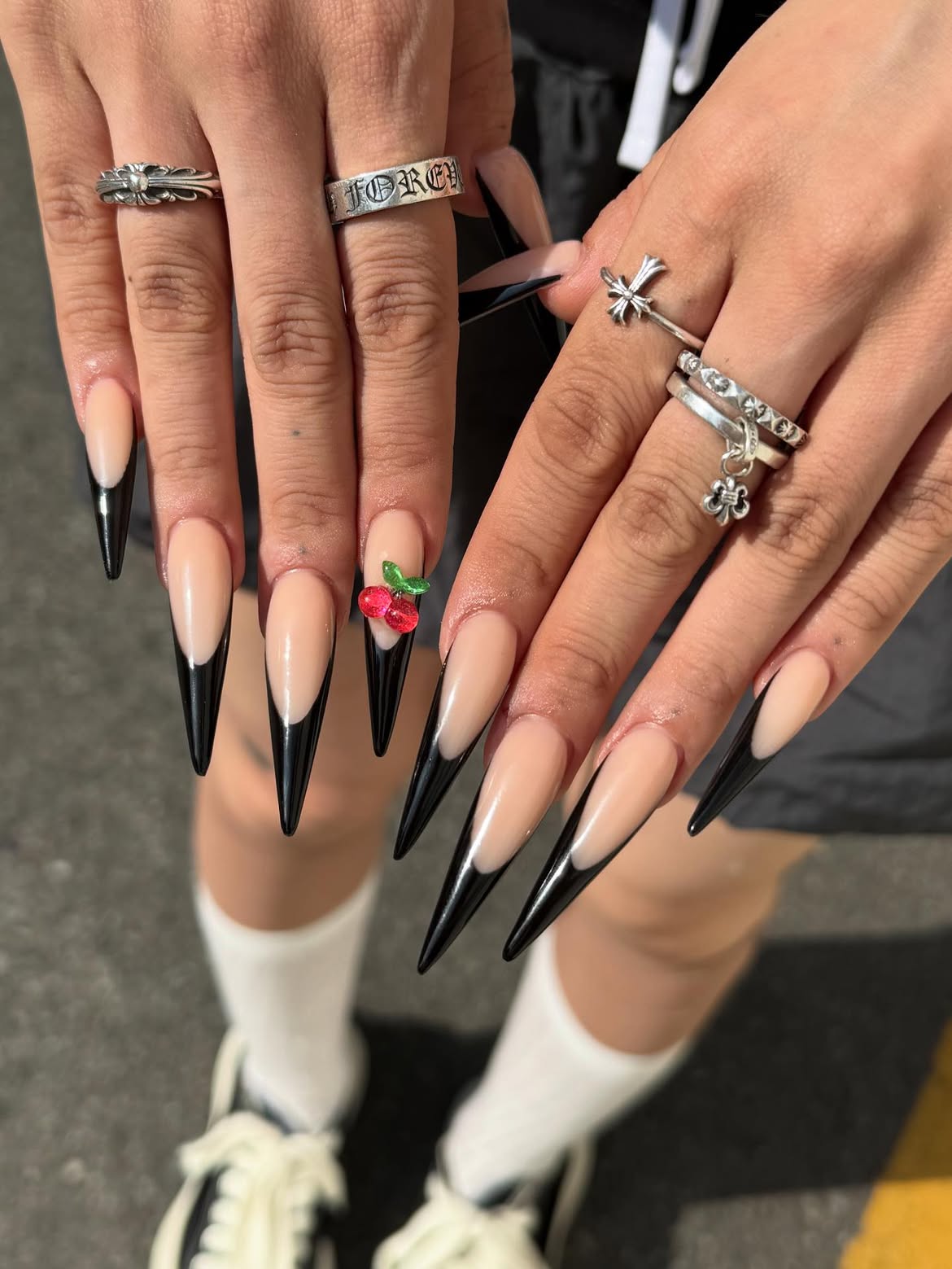 Black Stiletto French Tip Nails with Cherry Charm