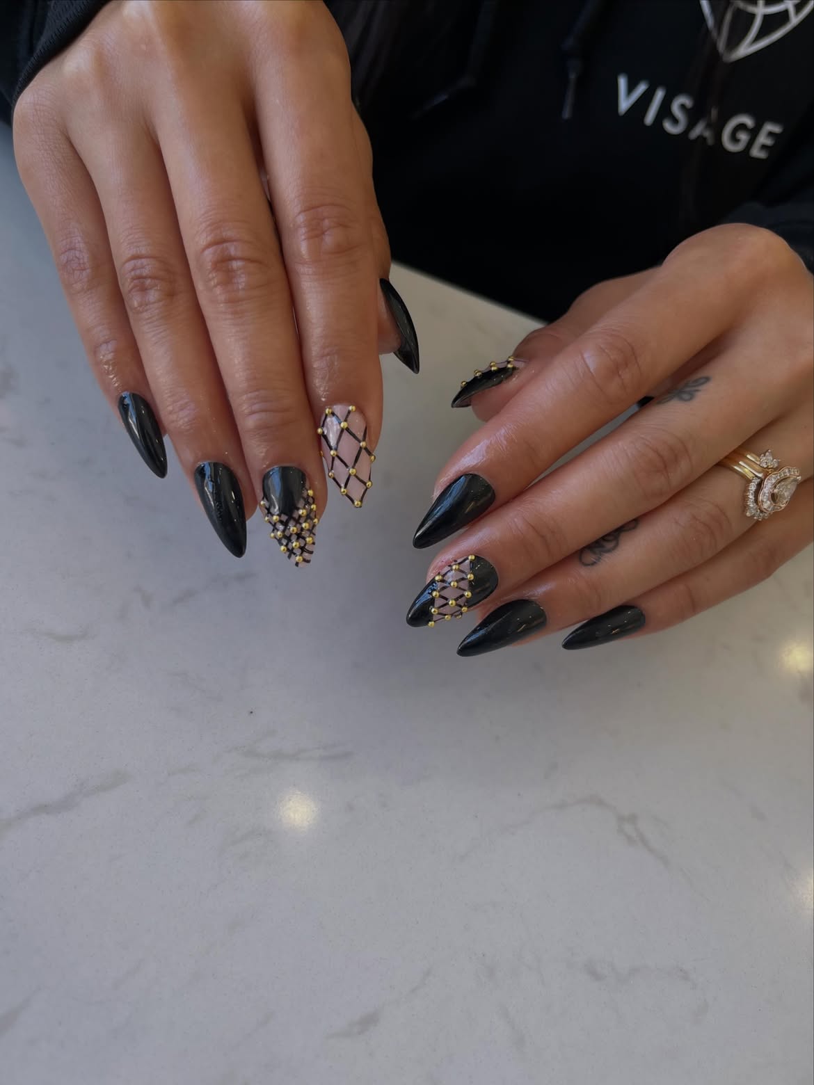 Black Stiletto Nails With Gold Net Embellishments