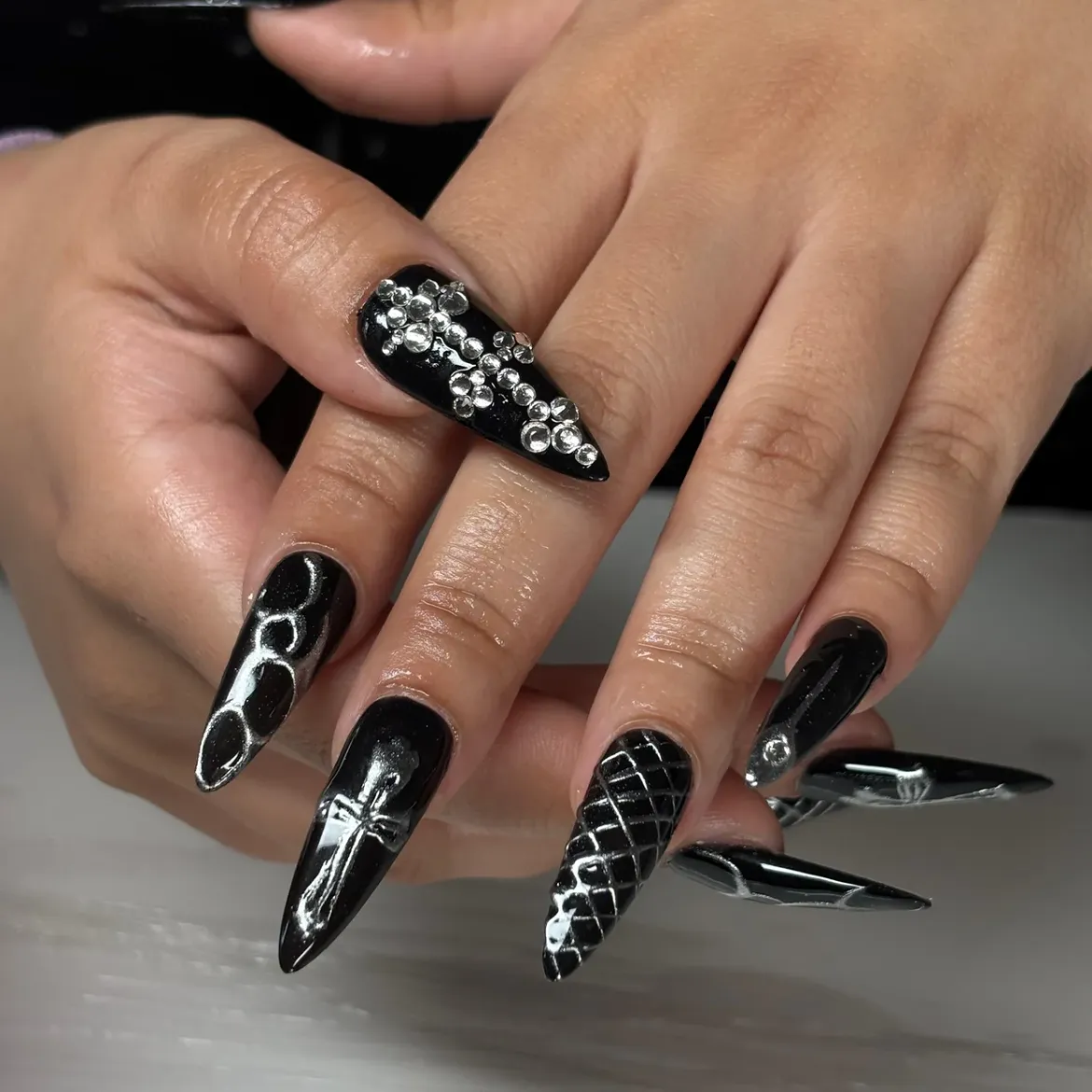 Black Stiletto Nails With Silver Embellishments