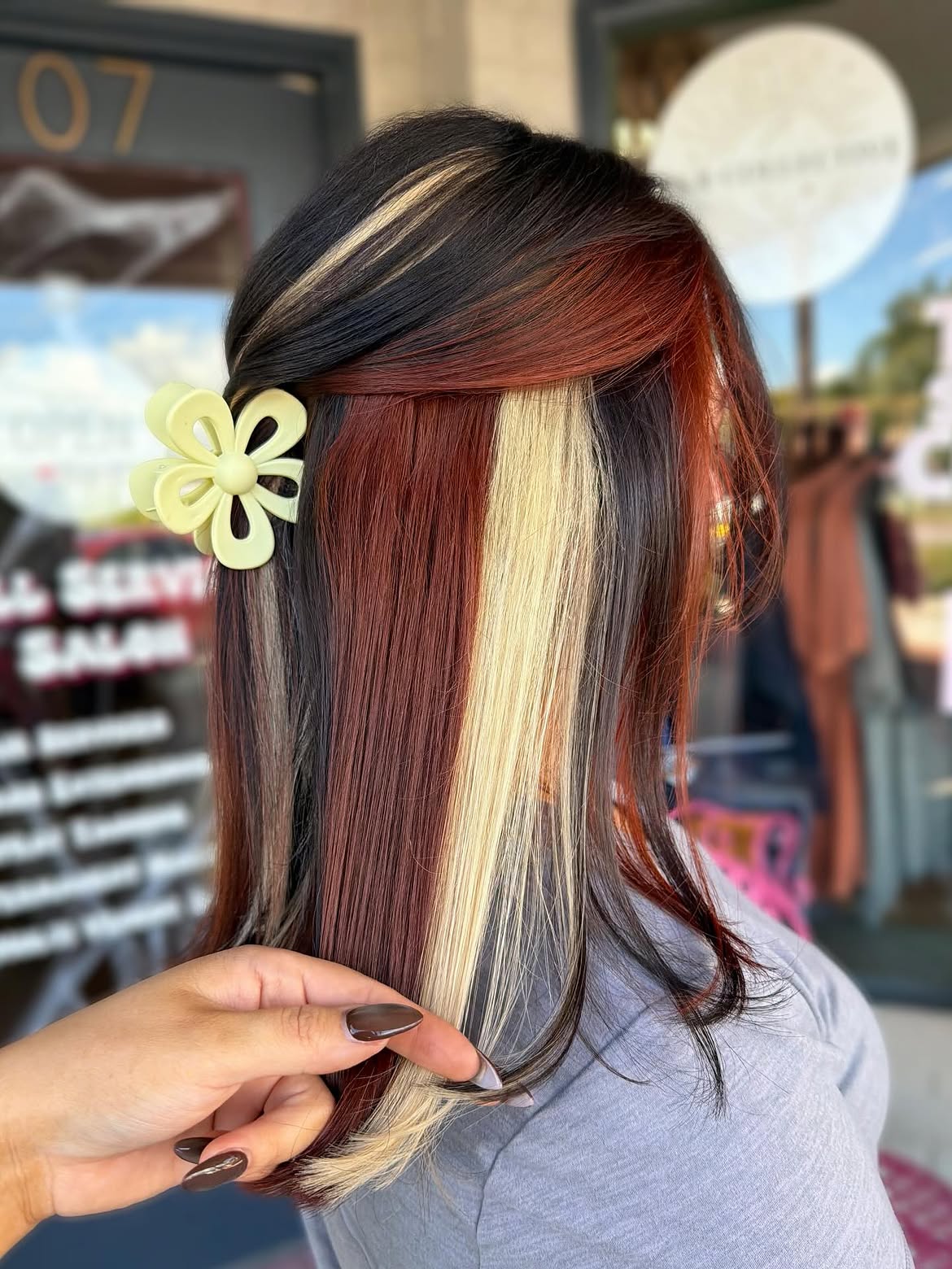 Bold Calico Hair Color With Claw Clip Accent