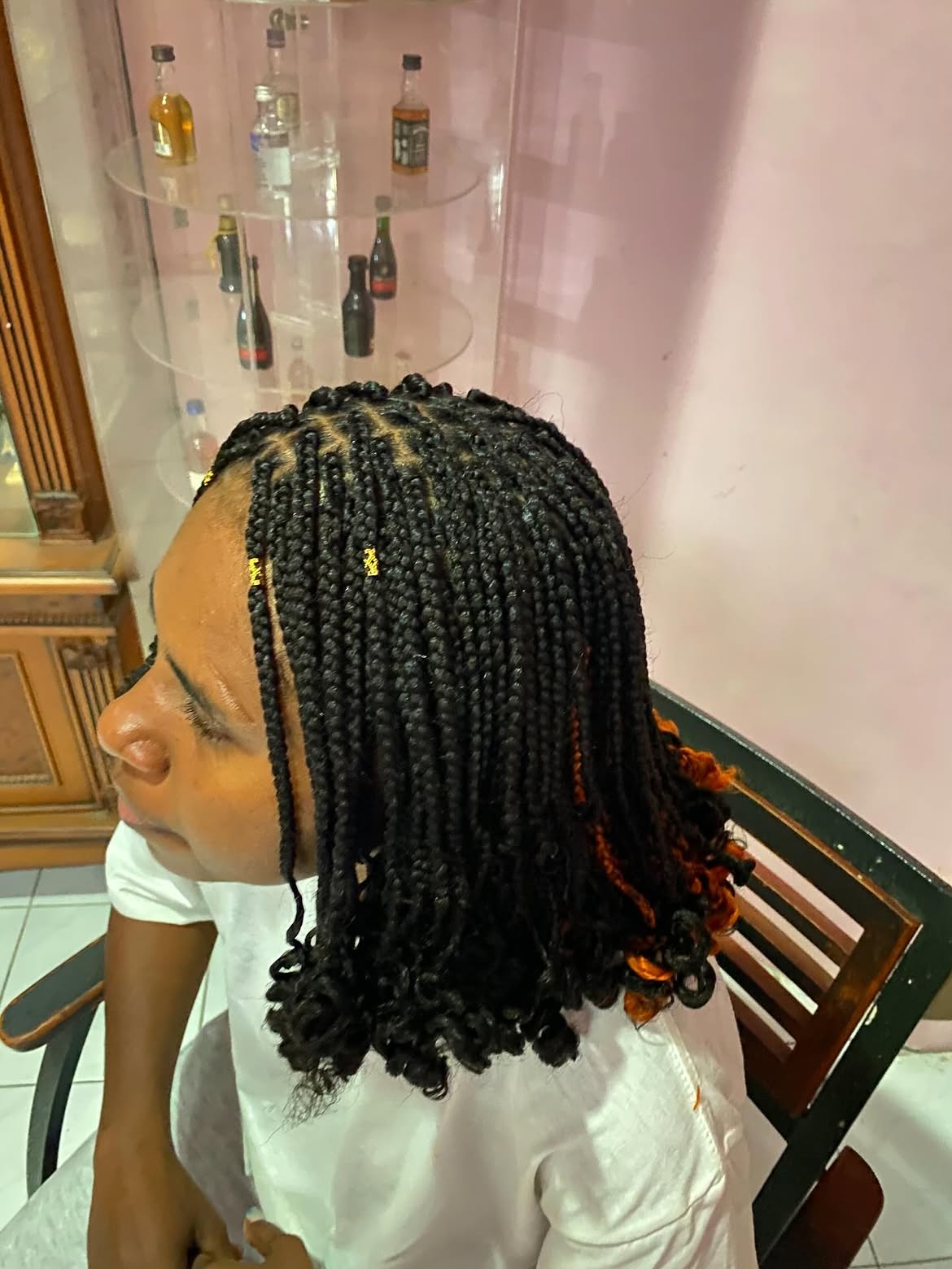 Box Braids With Curly Ends and Gold Accents