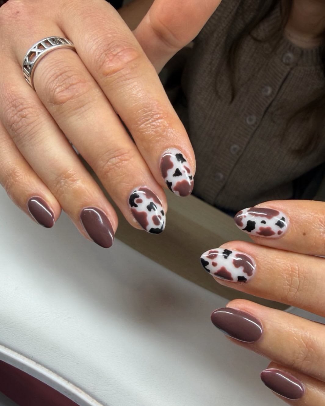 Brown Cow Print Matte Almond Nails