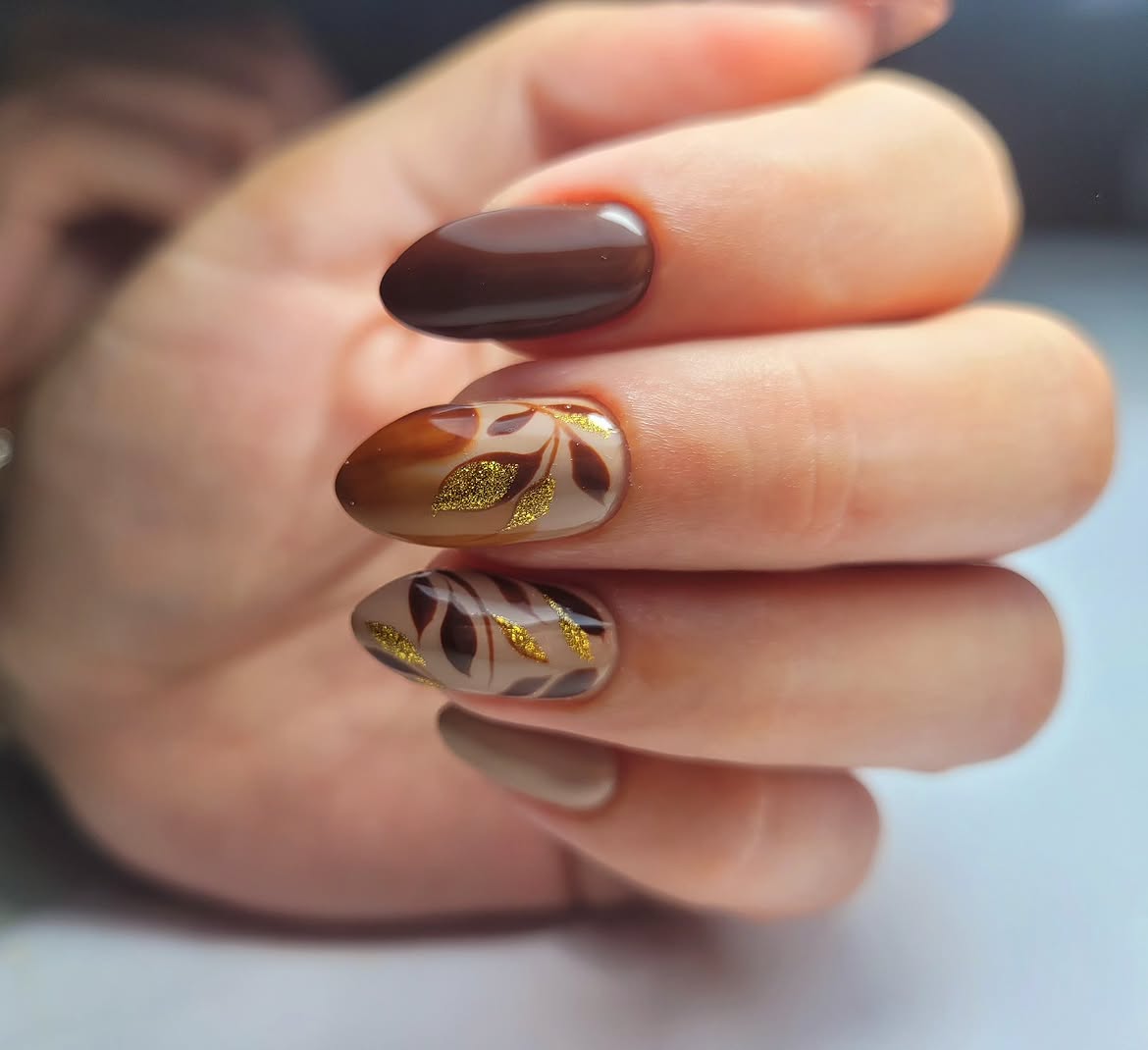 Brown Leafy Autumn Oval Nails with Gold Glitter