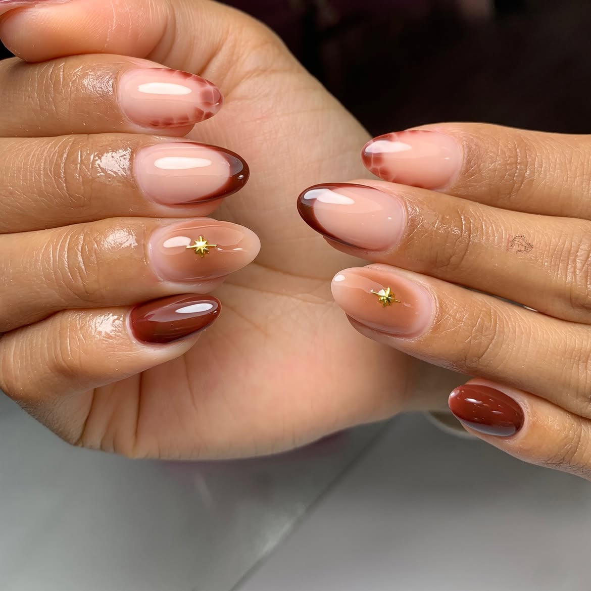 Brown Ombre French Tip Almond Nails with Gold Charms