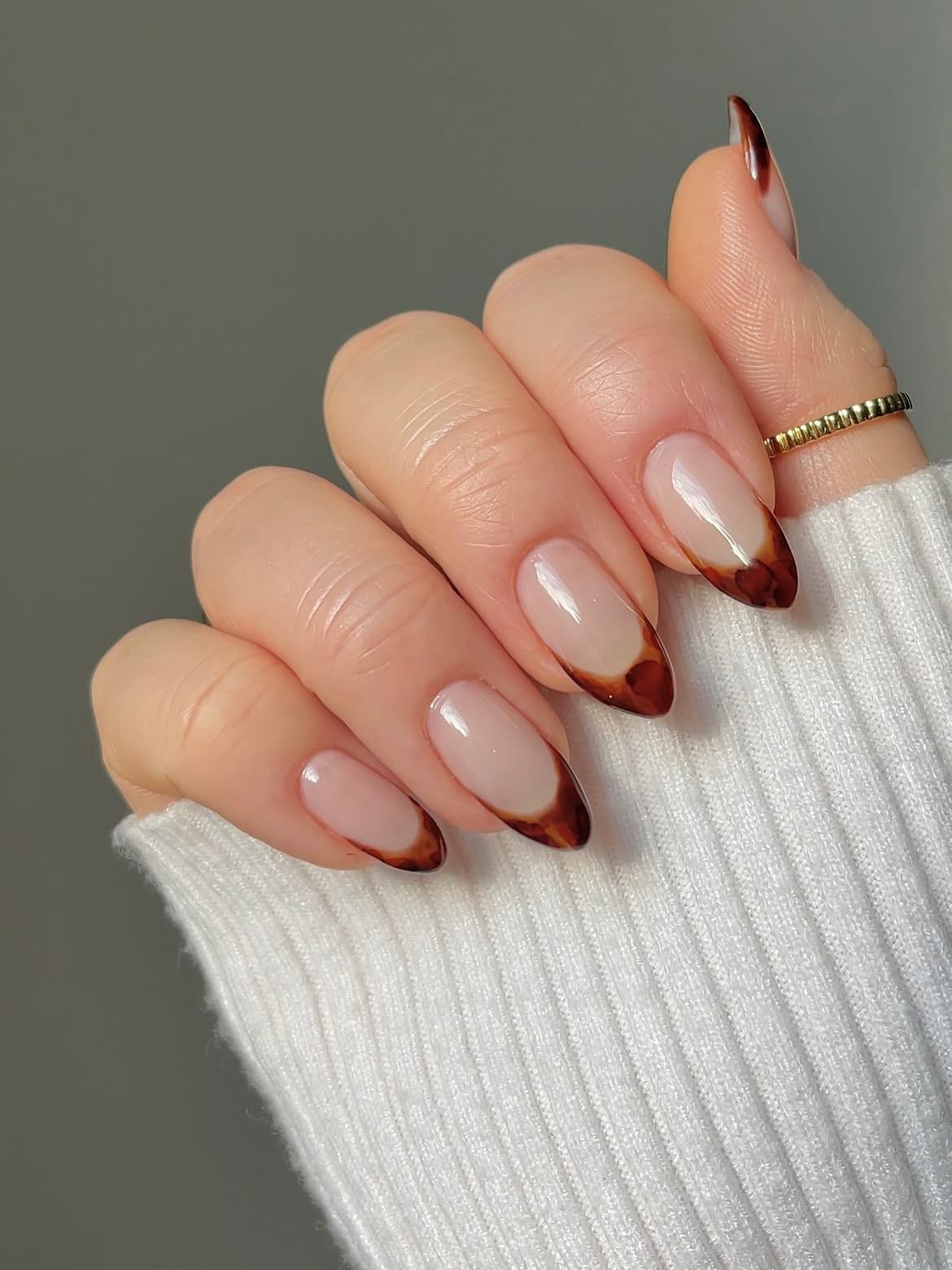 Brown Swirl French Tip Almond Nails