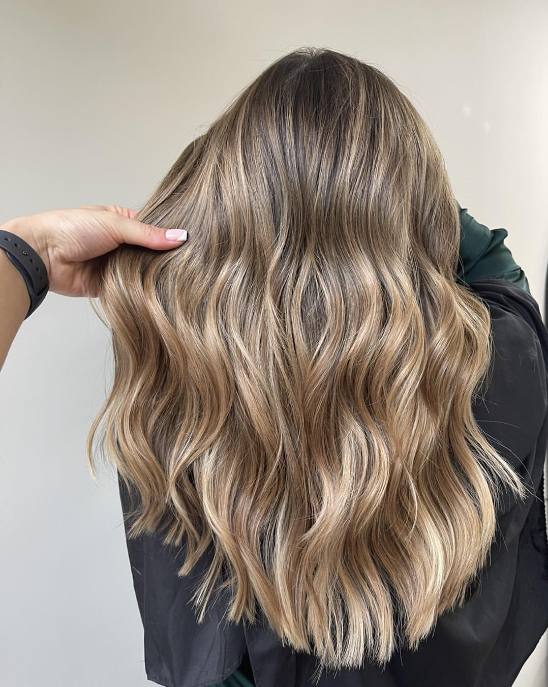 Champagne Blonde Balayage With Loose Beach Waves