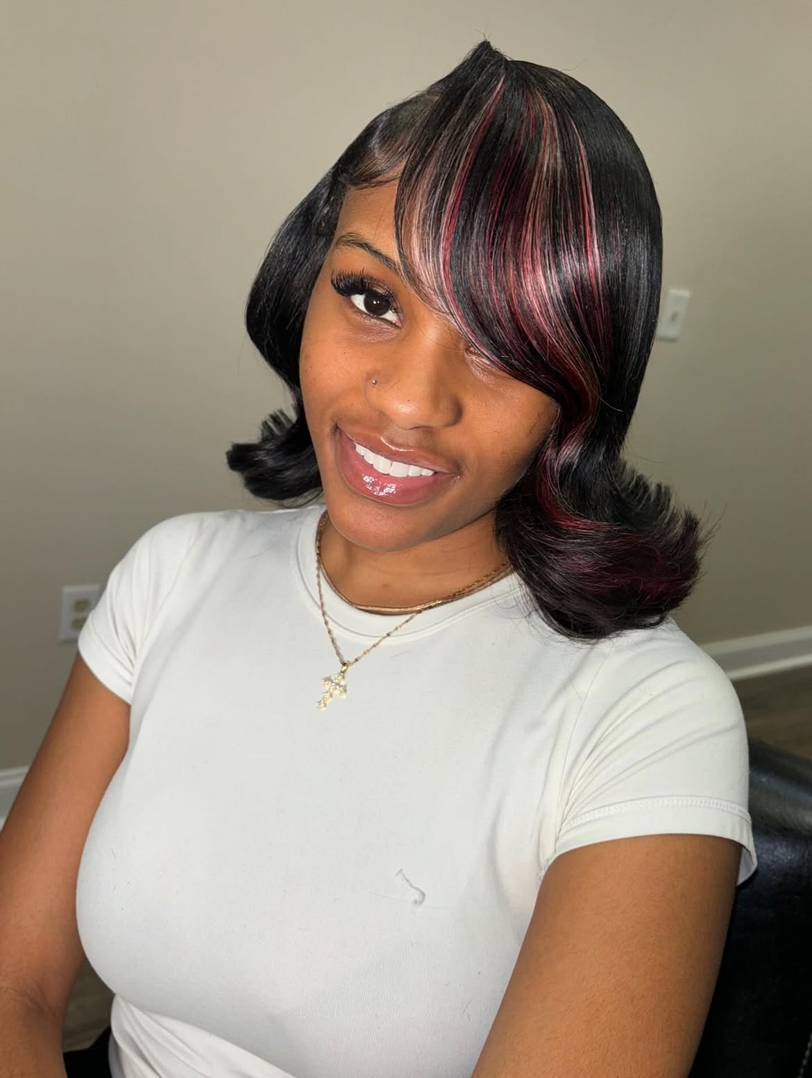 Chic Bob With Burgundy Highlights And Swoop Bang