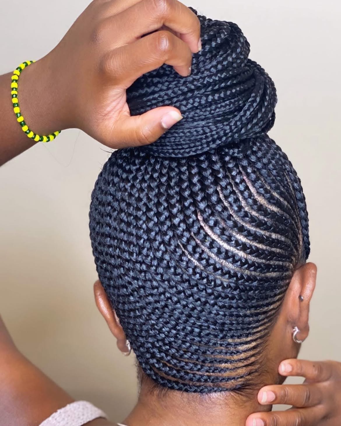 Chic Braided High Bun With Slicked Edges