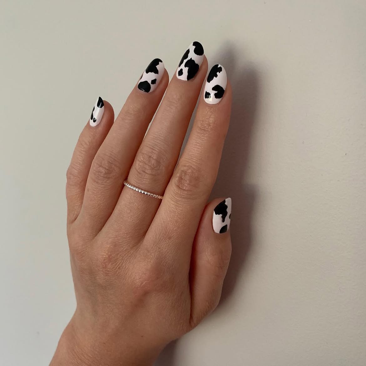Chic Cow Print Glossy Medium Almond Nails