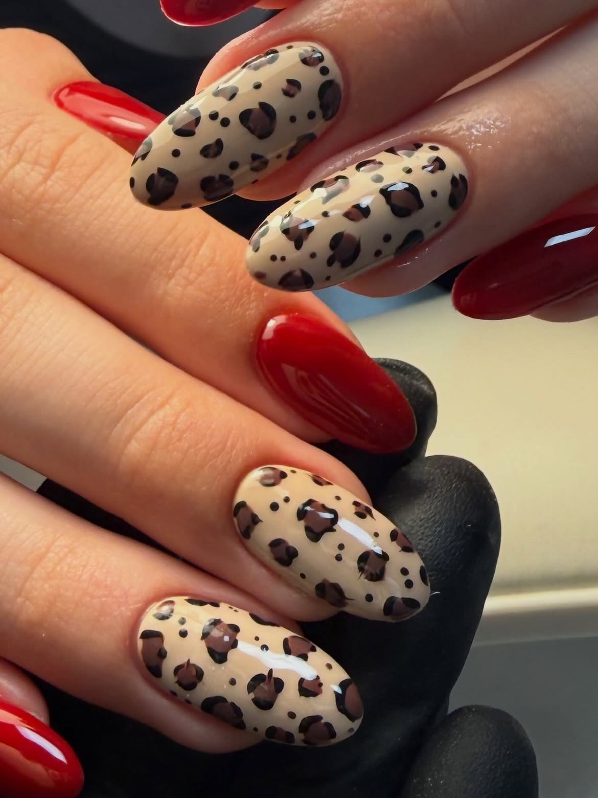 Chic Leopard Print Almond Nails With Cherry Accents
