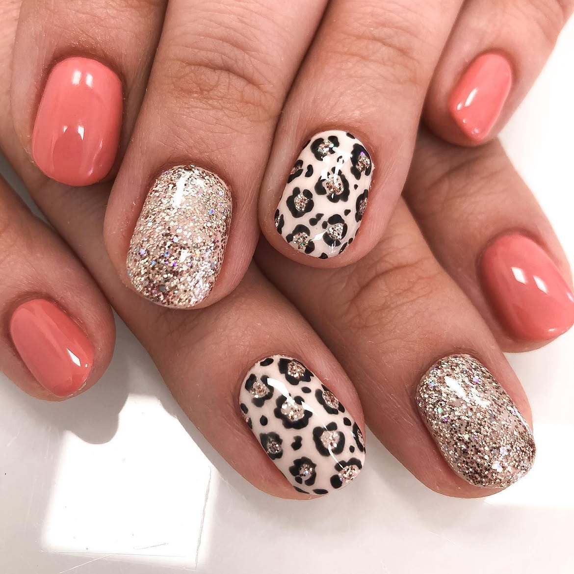 Coral Cheetah Glitter Mix Manicure