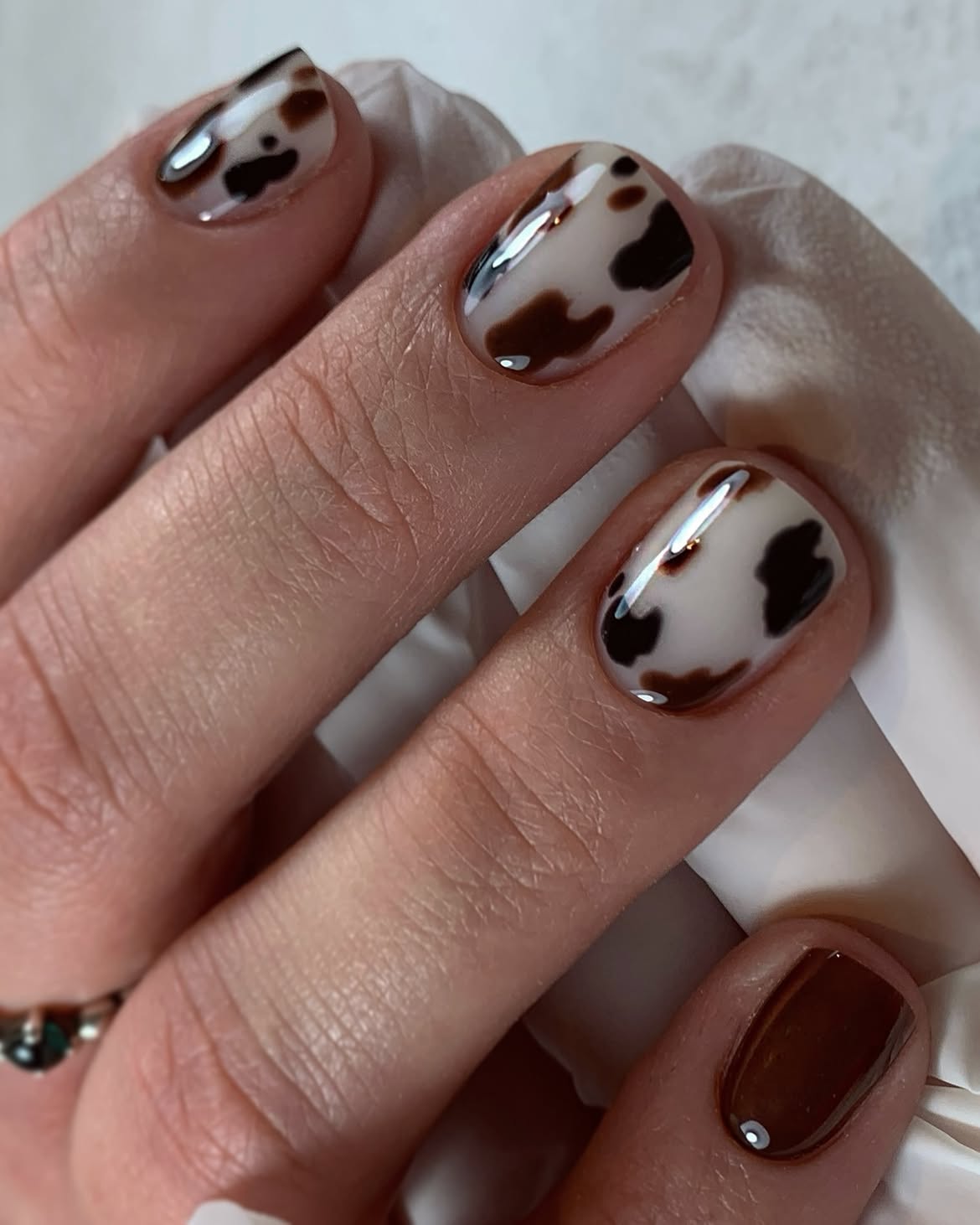 Cow Print Glossy Brown and Cream Nails